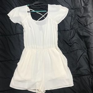 Semi open back romper
